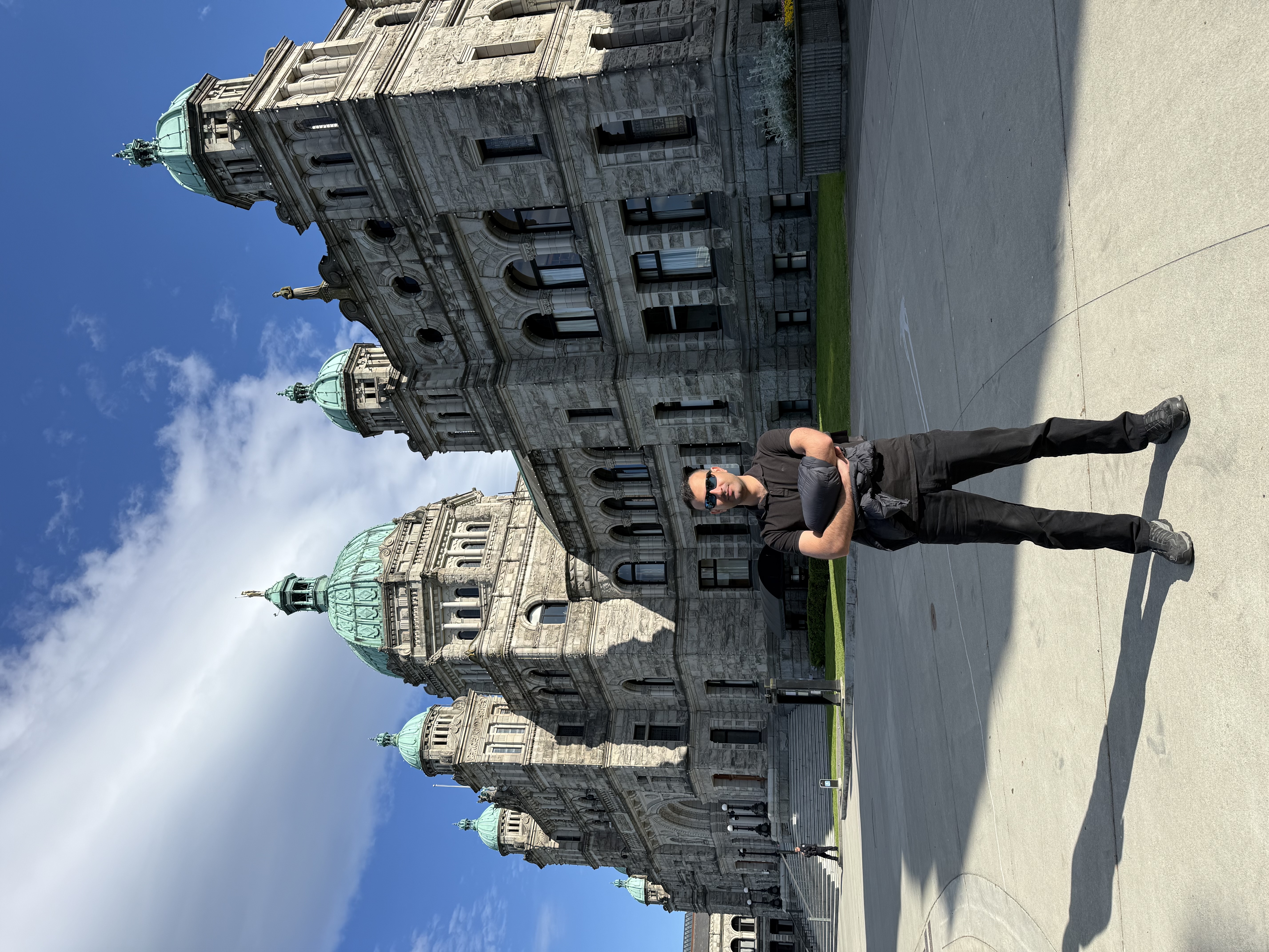 Salman Haider standing outside the British Columbia Parliament Buildings